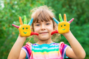 children-hands-colors-summer-photo-selective-focus